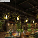 DecorBites™ Retro Metal Bicycle Restaurant Ceiling Light with 2 Black Drop Lamp Heads and Plant Decor