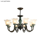 Rustic blackish green floral chandelier with frosted glass living room