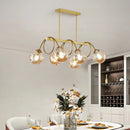 DecorBites™ Sleek Gold Spiral Island Light - Post-Modern Metal Ceiling Hang Lamp with Ball Glass Shade