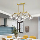 DecorBites™ Sleek Gold Spiral Island Light - Post-Modern Metal Ceiling Hang Lamp with Ball Glass Shade