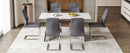 Table and chair set.63'x31.5x30' Luxurious Snow Mountain Patterned Sintered Stone Table with Silver Metal Butterfly Legs.Paried With 6 Dark Gray High-quality PU Chairs With Arched Metal Legs.