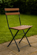 Dijon Folding Chair - Stackable -European Chestnut Wood Clear Coated Slats - Set of two angle outdoor view