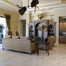 Denizli Beige Antique Pattern Travertine Tile - Full Truckload brushed chiseled installed on traditional living room floor with unique ceiling fan