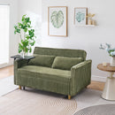 The pull-out and push-in green corduroy sofa with dual functions, equipped with a movable tabletop and USB ports, is suitable for use in living rooms and bedrooms.