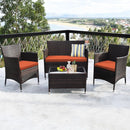 Rattan Patio Set With Cushioned Chairs And Glass Table