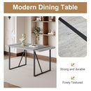 Table and chair set. Modern minimalist grey marble textured MDF dining table with metal frame. Comes with 6 chairs with PU cushions and black metal legs.