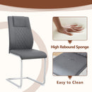 Table and chair set.63'x31.5x30' Luxurious Snow Mountain Patterned Sintered Stone Table with Silver Metal Butterfly Legs.Paried With 6 Dark Gray High-quality PU Chairs With Arched Metal Legs.