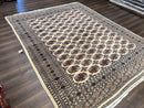 Pakistani Bokhara Rug 8x10, Traditional Turkoman Tribal Carpet, Allover Repeated Elephant Foot Motif, Ivory/Cream Black Red, Vintage Handmade