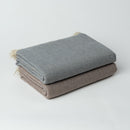 Ekani Throw Blankets