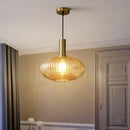 Elegant amber ribbed glass pendant lights for dining room