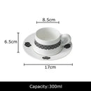 Elegant black and white floral porcelain cup and saucer set dining room