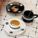 Elegant black and white floral porcelain cup and saucer set dining room
