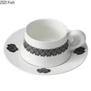 Elegant black and white floral porcelain cup and saucer set dining room