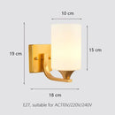 Elegant gold iron wall lamp with frosted glass shade for bedroom