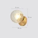 Elegant gold iron wall lamp with frosted glass shade for bedroom