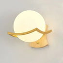 Elegant gold iron wall lamp with frosted glass shade for bedroom