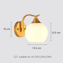 Elegant gold iron wall lamp with frosted glass shade for bedroom