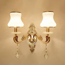 Elegant gold scrolled arm wall mount sconce bedroom crystal light