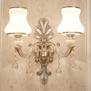 Elegant gold scrolled arm wall mount sconce bedroom crystal light