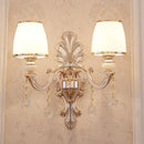 Elegant gold scrolled arm wall mount sconce bedroom crystal light