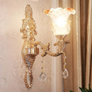 Elegant gold scrolled arm wall mount sconce bedroom crystal light