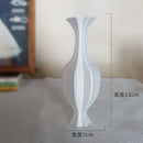 Elegant silver twisted flowing vase living room decor