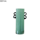 Emerald green glass vase with black handles living room decor