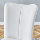 Table and chair set.64.5x35.4 Inch Stylish White Marble Textured Dining Table.Paried With 4 White PU Chairs with a vertical stripe design on the backrest.Create Your Exclusive Low-Key Luxury Space.
