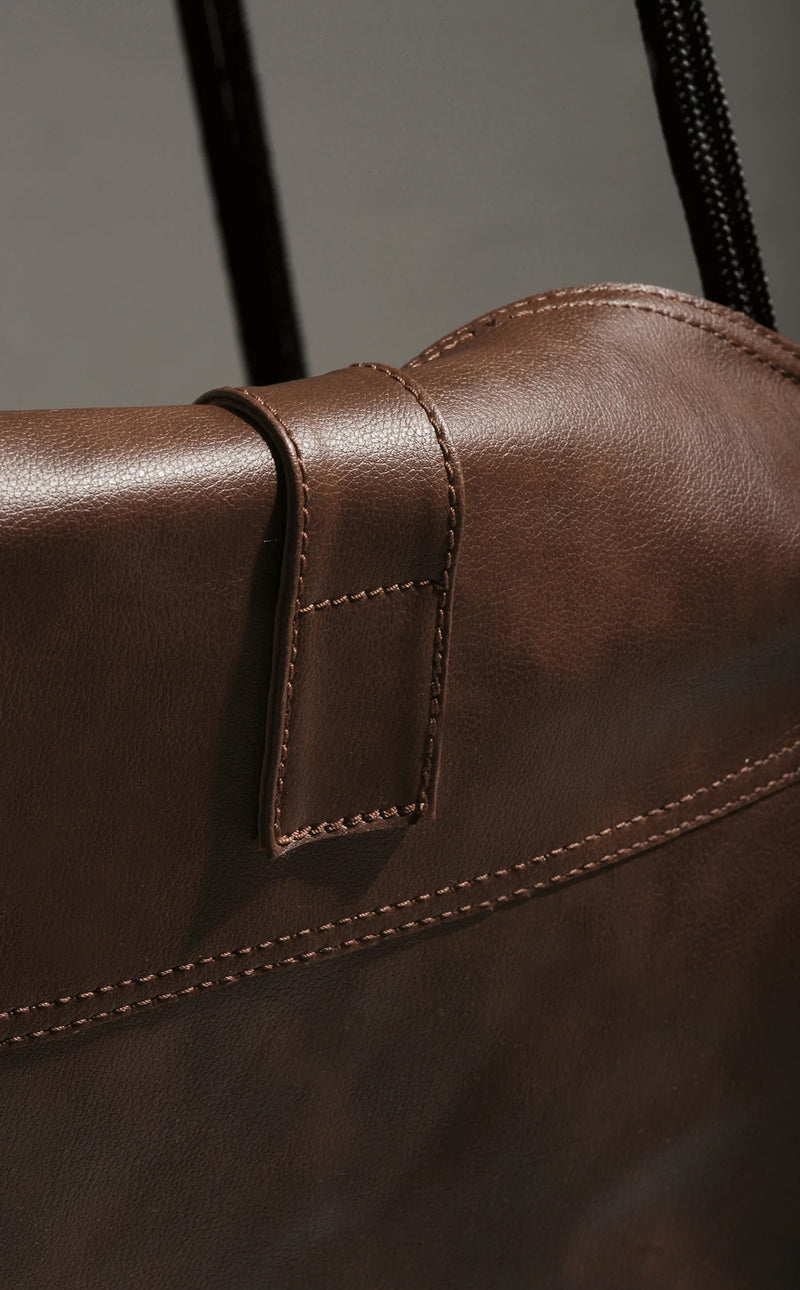 faux leather hanging round chair brown product shot closeup