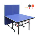 Blue table tennis table with two paddles and a ball on a white background