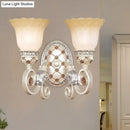 French country gold wall sconce with opaline glass – living room
