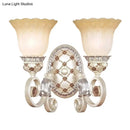 French country gold wall sconce with opaline glass – living room