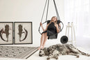 Genuine Leather Round Hanging Chair Black Blonde woman with black Dres dog on the floor side table wşde view