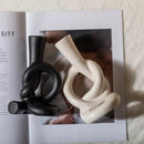 Geometric black & white ceramic knot candle stand living room decor