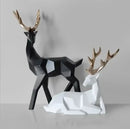 Geometric black & white deer sculpture living room decor with gold antlers