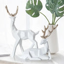 Geometric black & white deer sculpture living room decor with gold antlers