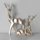 Geometric black & white deer sculpture living room decor with gold antlers