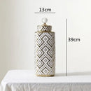 Geometric white and golden relief decorative jar kitchen canister