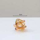Geometric wound glass twine sphere amber & clear living room decor