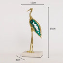 Gold and emerald crystal crane sculpture living room decor