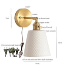 Gold ceramic led wall sconce with ribbed shade for bedroom