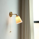 Gold ceramic led wall sconce with ribbed shade for bedroom