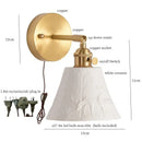 Gold ceramic led wall sconce with ribbed shade for bedroom