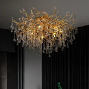 Gold tree branch chandelier with crystal droplets for dining room