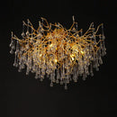 Gold tree branch chandelier with crystal droplets for dining room