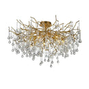 Gold tree branch chandelier with crystal droplets for dining room