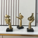 Golden abstract mask statue for home office decor