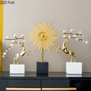Golden deer antlers statue with white blossoms living room decor