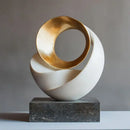 Golden geometric tree hole sculpture on volcanic rock living room decor