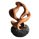 Golden geometric tree hole sculpture on volcanic rock living room decor